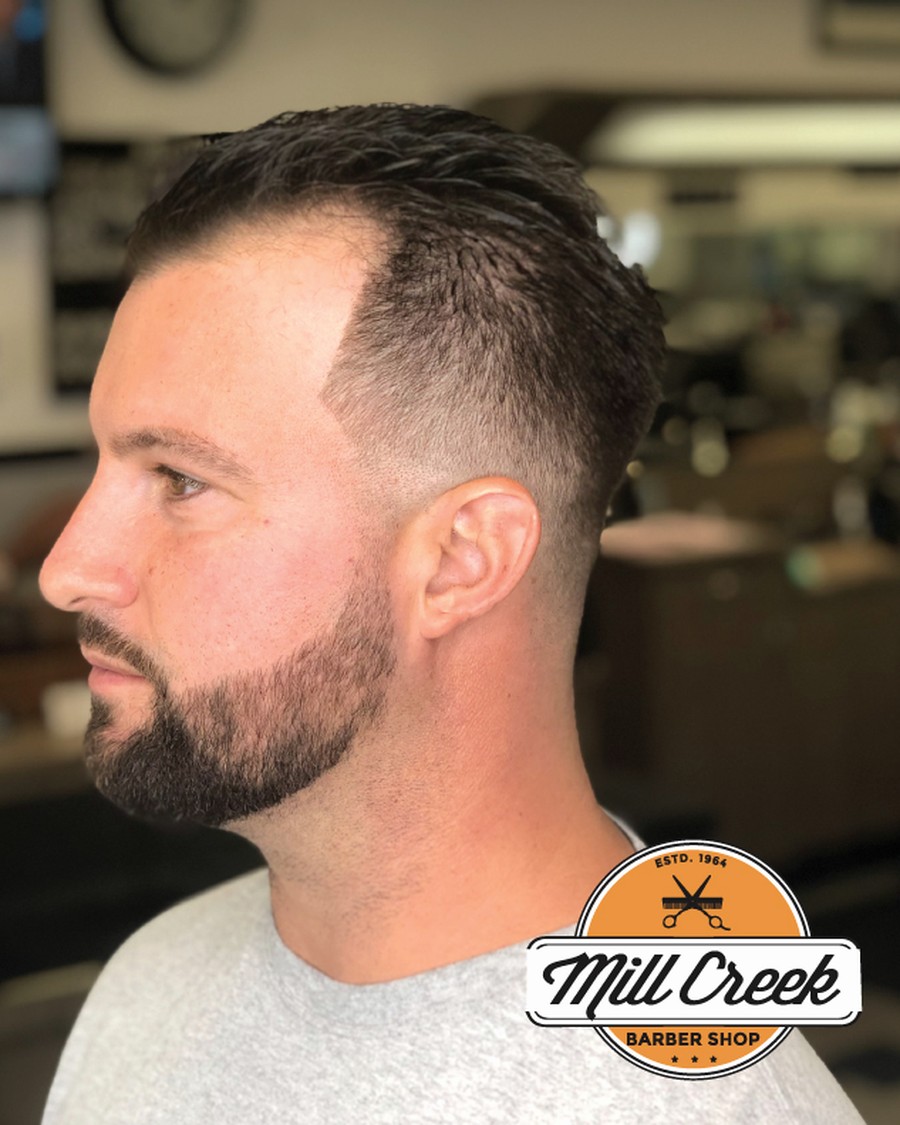 Finished fade and beard work at Mill Creek Barbershop